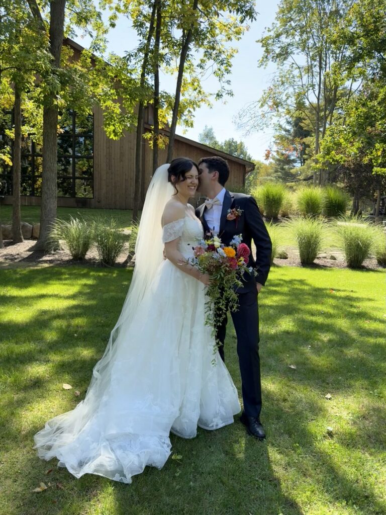 michigan outdoor wedding bride and groom kissing 